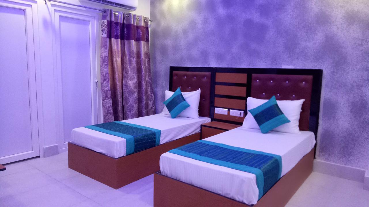 Capital O 13310 Noida Suites ภายนอก รูปภาพ
